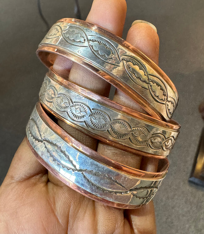 Navajo made copper & silver bracelets